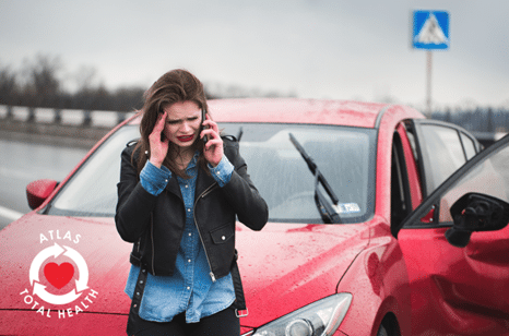 a woman after a car accident