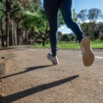 Feet running along residential road